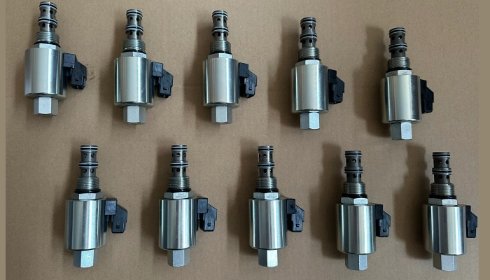 Close-up of an excavator hydraulic solenoid valve