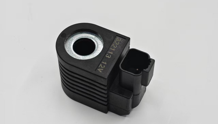 Close-up of a 12V solenoid valve coil label — nearly identical in appearance to a 24V coil
